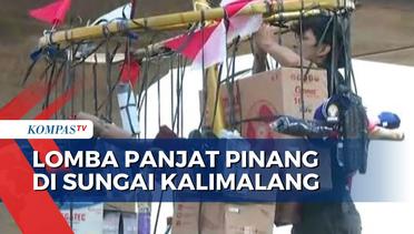 Seru! Warga Cipinang Melayu Lomba Panjat Pinang di Aliran Sungai Kalimalang