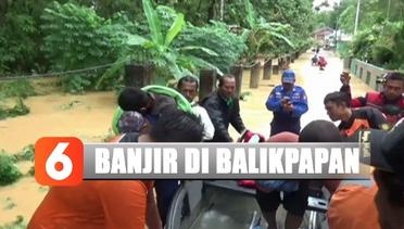 Detik-detik Petugas Evakuasi Warga Korban Banjir di Balikpapan