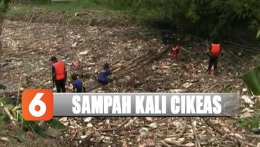Petugas Terus Bersihkan Tumpukan Sampah Bambu dan Kayu di Kali Cikeas - Liputan 6 Terkini