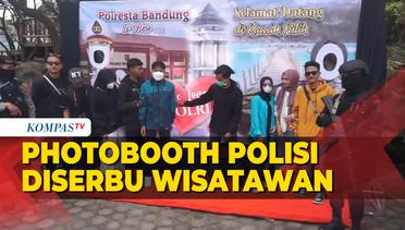 Aksi Warga Foto Bareng Personel Polisi di Photobooth Polresta Bandung