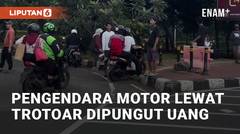 Detik-detik Pengendara Motor Lewat Trotoar Dipungut Uang di Jakarta Pusat