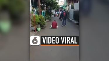 Viral, Pemuda Tertidur di Jalan Hingga Sholat Ied Selesai