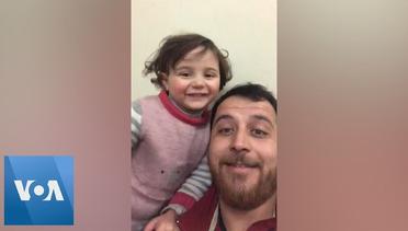 Father Plays Laughing Game With Daughter as Airstrikes Hit Idlib, Syria