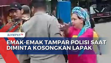 Emak-emak di Makassar Tampar Polisi saat Diminta Kosongkan Lapak