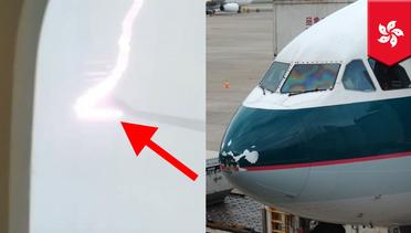 Pesawat Cathay Pacific tersambar petir di tengah badai - TomoNews