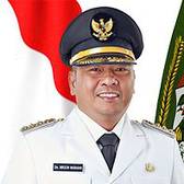 Drs. Nikson Nababan, M.Si,