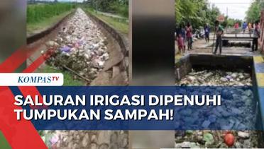Waduh! Tumpukan Puluhan Ton Sampah Penuhi Saluran Irigasi