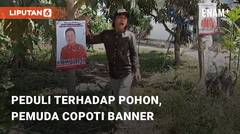 Peduli Terhadap Pohon, Seorang Pemuda Copoti Banner Yang Dipaku