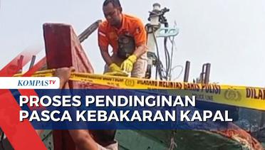 Petugas Lakukan Pendinginan di TKP Pasca Kebakaran 52 Kapal diPelabuhan Tegalsari