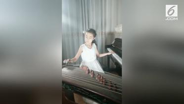 Aksi Gadis 9 Tahun Bermain 2 Alat Musik Sekaligus