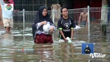 Tim SAR Evakuasi Korban Banjir Penderita Stroke di Samarinda - Fokus