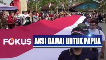 Gelar Aksi Damai untuk Papua, Ribuan Warga Lintas Etnis Bentangkan Bendera Merah Putih Raksasa - Fokus Pagi