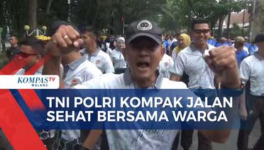 Rayakan HUT Kostrad Ke-63, TNI Polri Jalan Sehat Bersama Warga