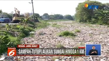 Live Report Sampah Masih Menumpuk di Kali Pisang Batu - Liputan 6 Siang