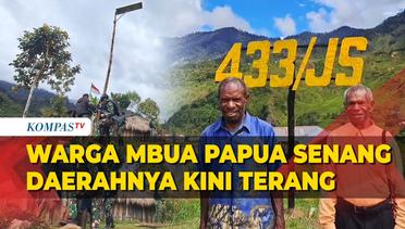 TNI Bantu Masyarakat Pendalaman Papua Pasang Lampu Solar Cell